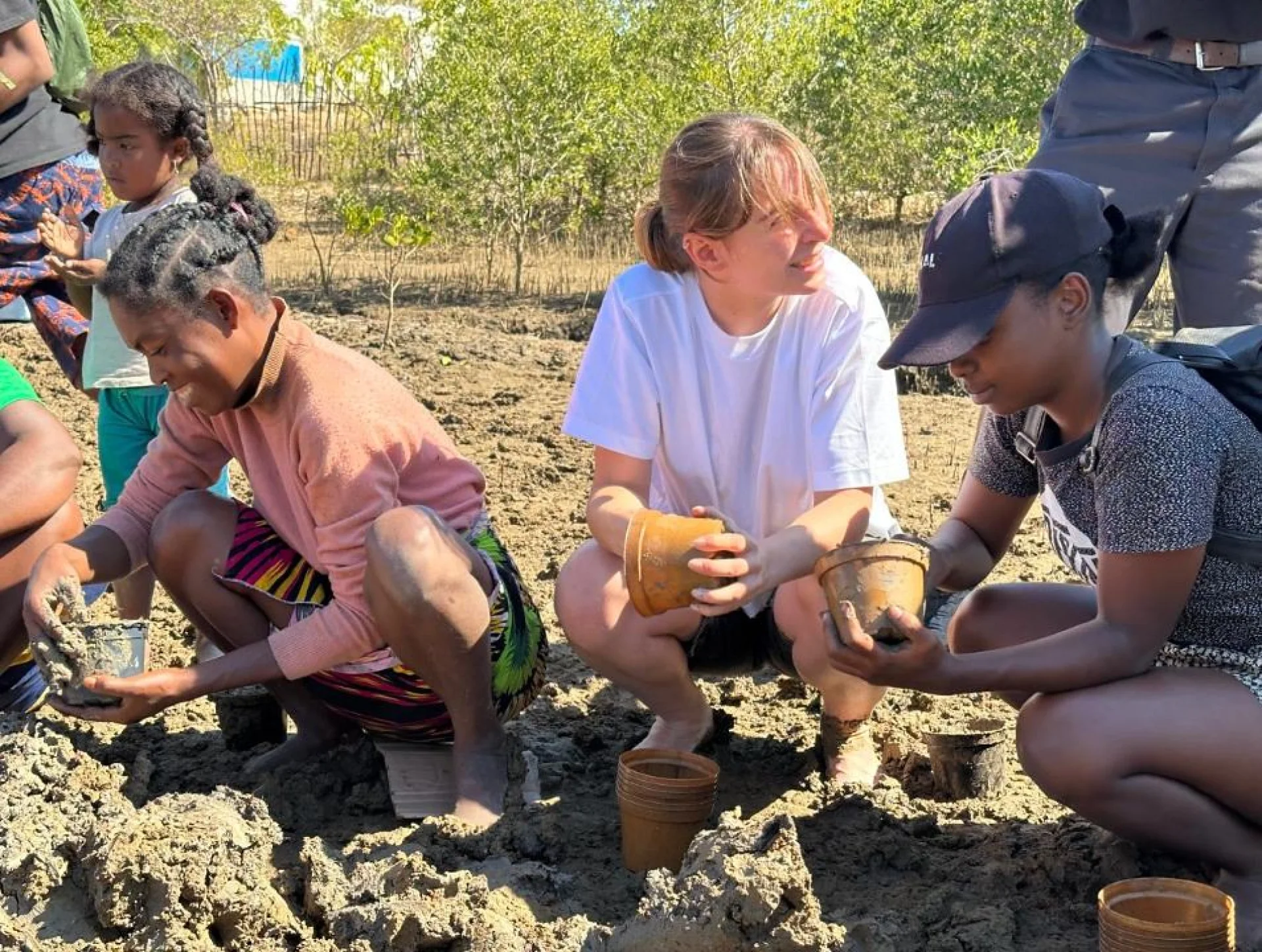 Solinatra and the Evertreen local team standing together on the Kimony mangrove site, western Madagascar